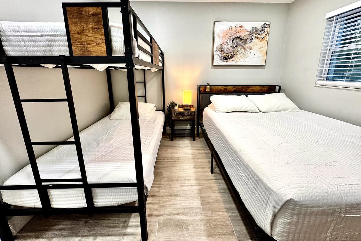 The simplicity of the design allows guests to personalize the space with their belongings, making it feel like home during their stay.