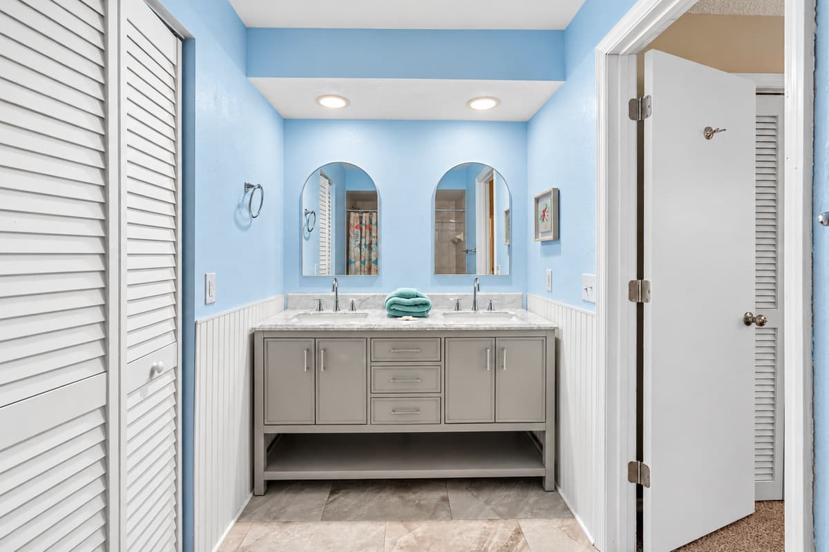 Ensuite bathroom connected to the master bedroom - At the heart of the ensuite, you’ll find a stunning his-and-hers sink vanity, offering ample counter space and storage.