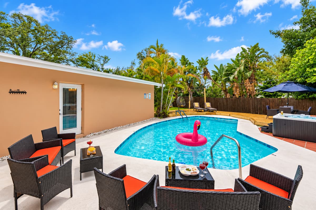 Swim, sip, and savor the outdoors with poolside dining, hanging egg chairs, and a resort-inspired layout made for vacation living.