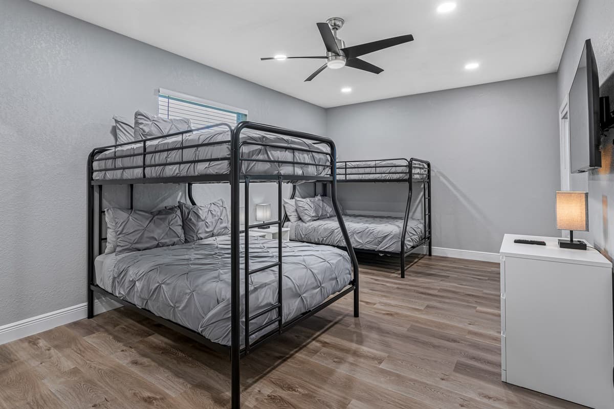 Great for family with kids or an inseparable group of friends. This incredible bedroom has two single over double bunkbeds, full length mirror closet, drawers and a smart TV. Book it now!