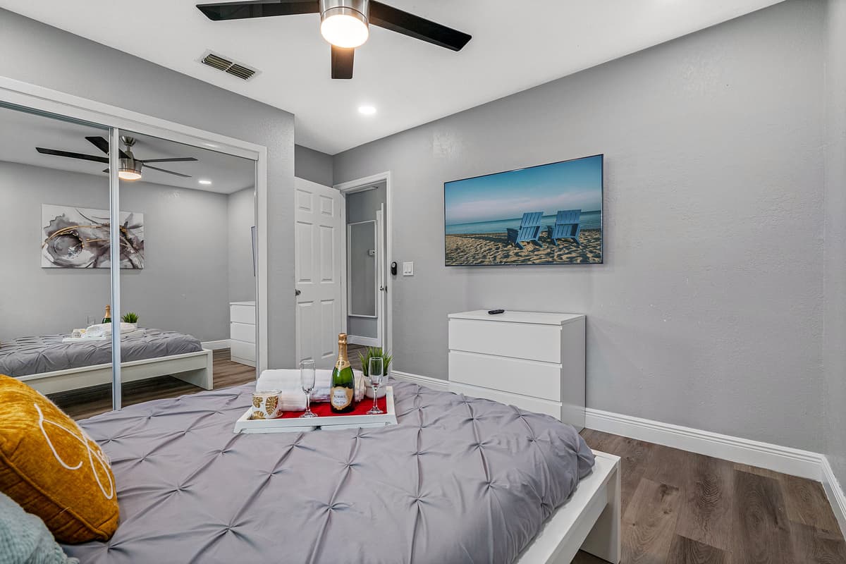 Enjoy the comfort while staying at your home far from home. This lovely bedroom has a queen size bed, smart TV, drawers and a full sized mirror closet..
