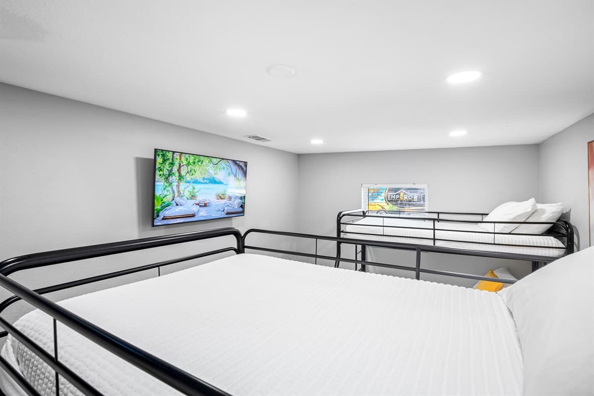 Enjoy restful nights in this bright and inviting room designed to comfortably accommodate multiple guests.