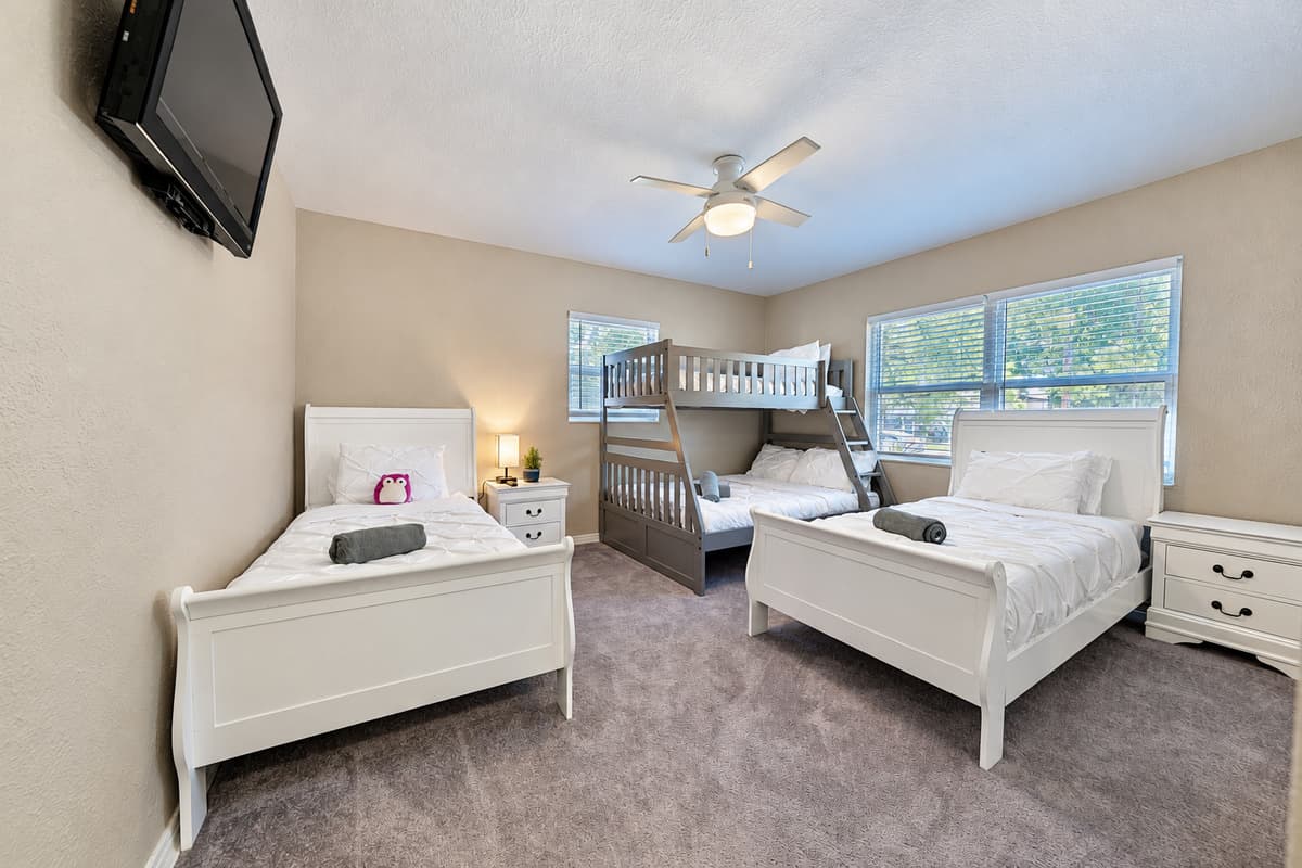 Our thoughtfully furnished bedroom ensures everyone enjoys a restful night's sleep with soft linens, plump pillows, and cozy duvets.