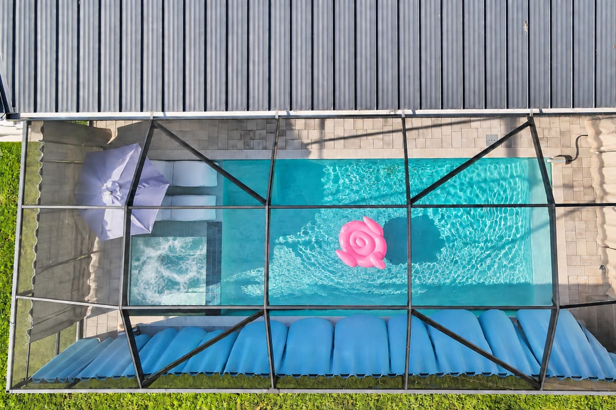A covered pool that lets you swim at dusk, completely mosquito-free, with rain never getting in the way.
