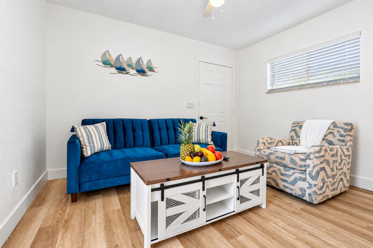Chic and private studio suite with everything you need—comfy queen bed, kitchenette, cozy lounge, and smart TV.