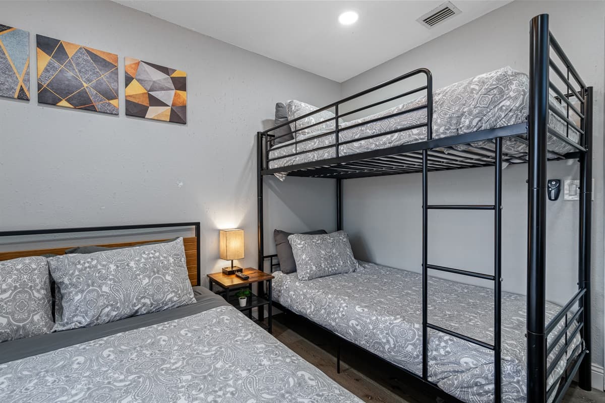 Lovely bedroom with a comfortable huge bed and a single bunkbed. This room also has its own TV. Feel at home in your home away from home. If you think you'd enjoy your trip to this property, send us a message now!