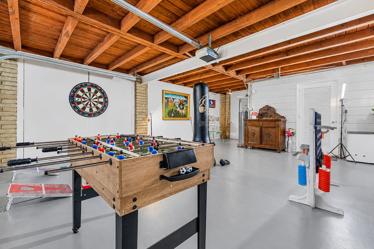 Designed for play and laughter, this game room offers a variety of games and wide-open space to spread out and enjoy.