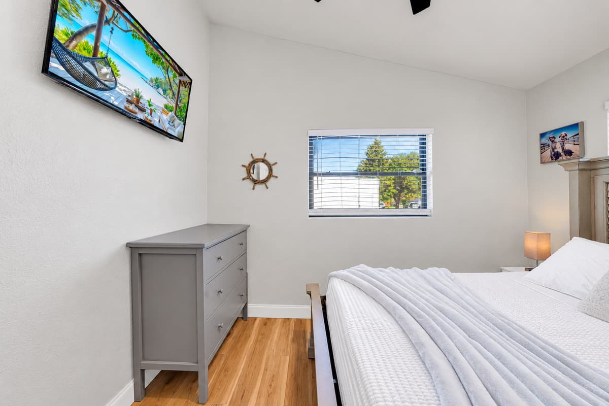 The Smart TV in here matters more than you'd think it would. Sunburned, over-walked and out of conversation by 9 PM, the whole plan becomes air conditioning, a big comfortable bed and whatever you stream back home.
