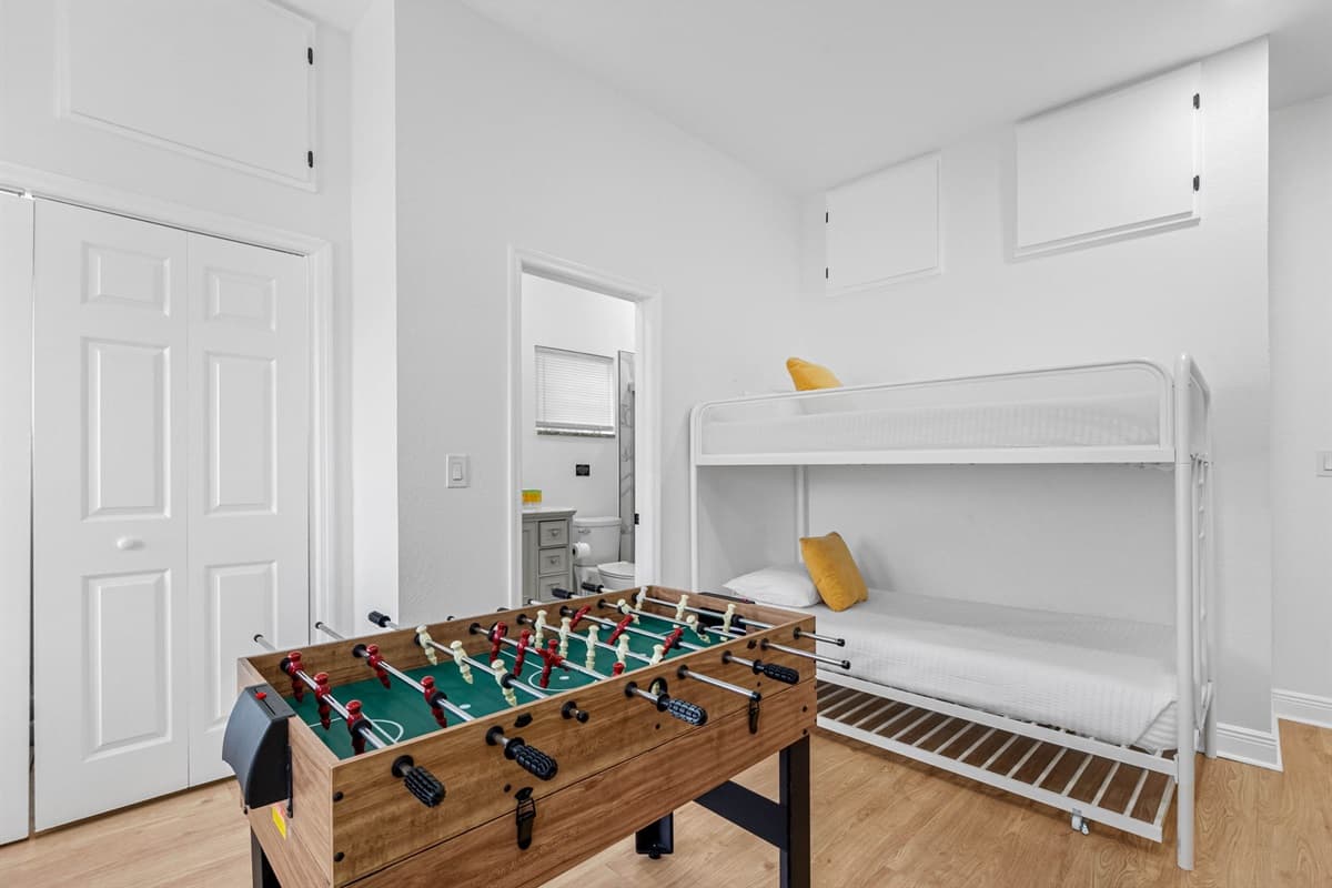 Thoughtfully set up with bunk beds and games, this room offers a fun and safe space for younger guests to unwind.