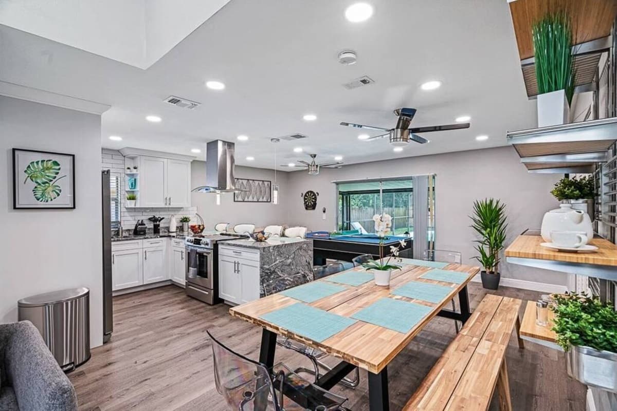 Our Kitchen is an open view of the pool and pool/ping pong table. It is also very accessible to our lovely dining area and the living room. Never miss a story while cooking your favorite meal. Send us an inquiry now!
