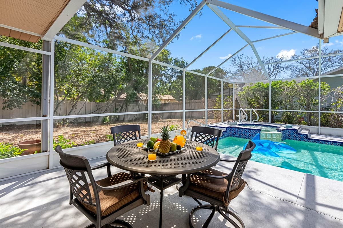 Comfortable outdoor chairs are provided for lounging, reading, or simply relaxing by the water with your favorite drink in hand.