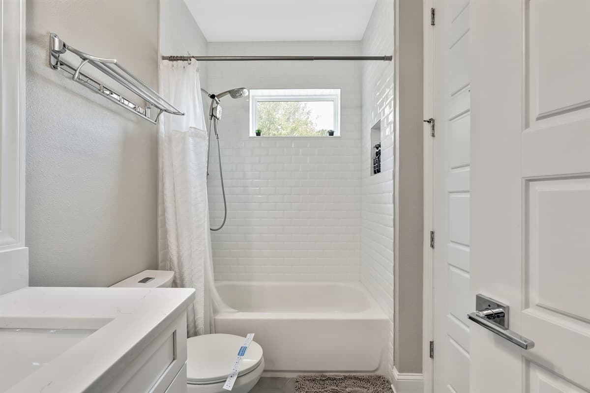 The modern fixtures and high-quality materials ensure a comfortable and enjoyable bathing experience.