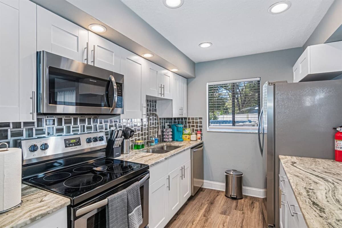 Have a great and fun time preparing delicious meals for the entire group during your stay! Our modern kitchen has every equipment you'd need to make it perfect! Book this property now!