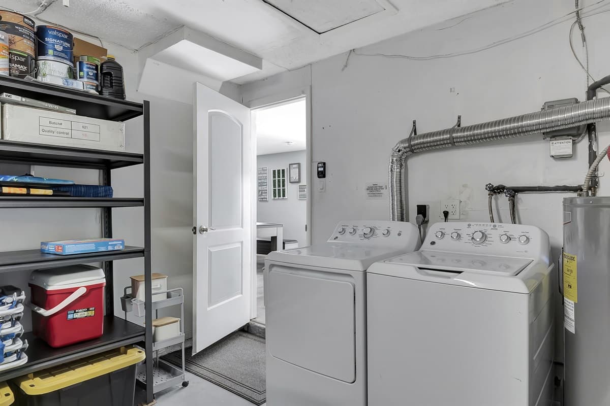 Our laundry area is equipped with a full washer and dryer setup, along with all the essential laundry supplies you need.