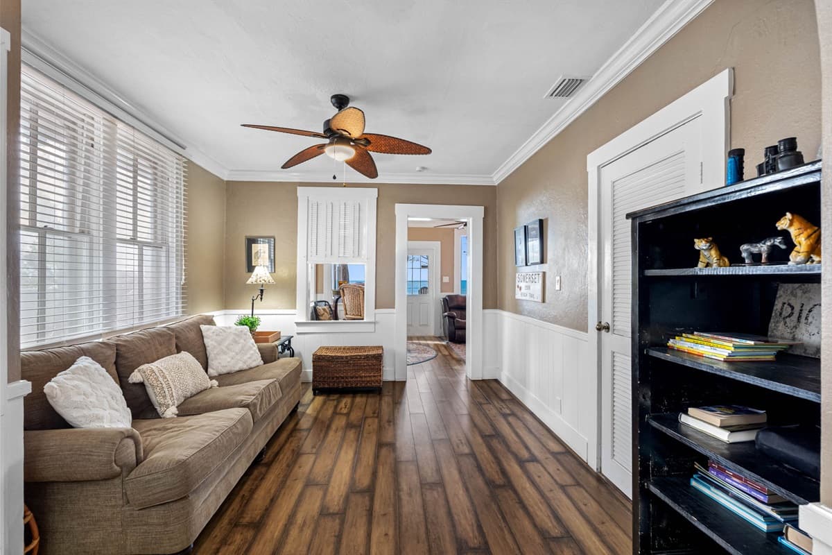 These couches are arranged to maximize both comfort and conversation, making the living room an ideal place for socializing or enjoying some quiet time.