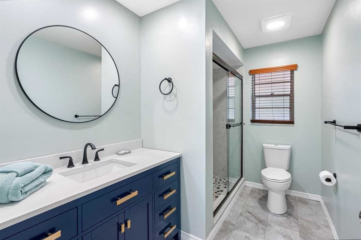 The second bathroom offers a clean, stylish, and functional space designed to meet the needs of all guests.