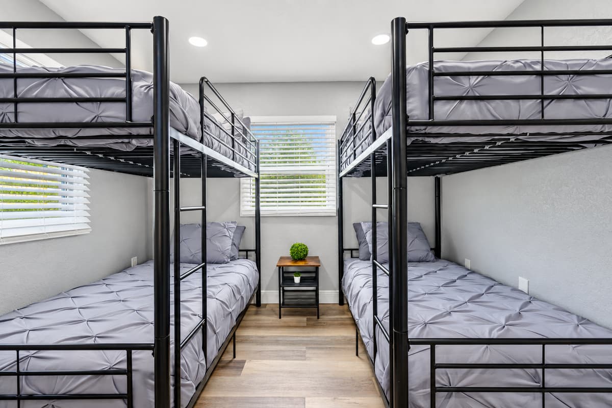 Bunk beds for the whole kids' crew. Bedroom 3 has two bunk beds with four sleeping spots, a Smart TV, and fresh bedding. Kids and teens get their own room, and parents get their evenings back.