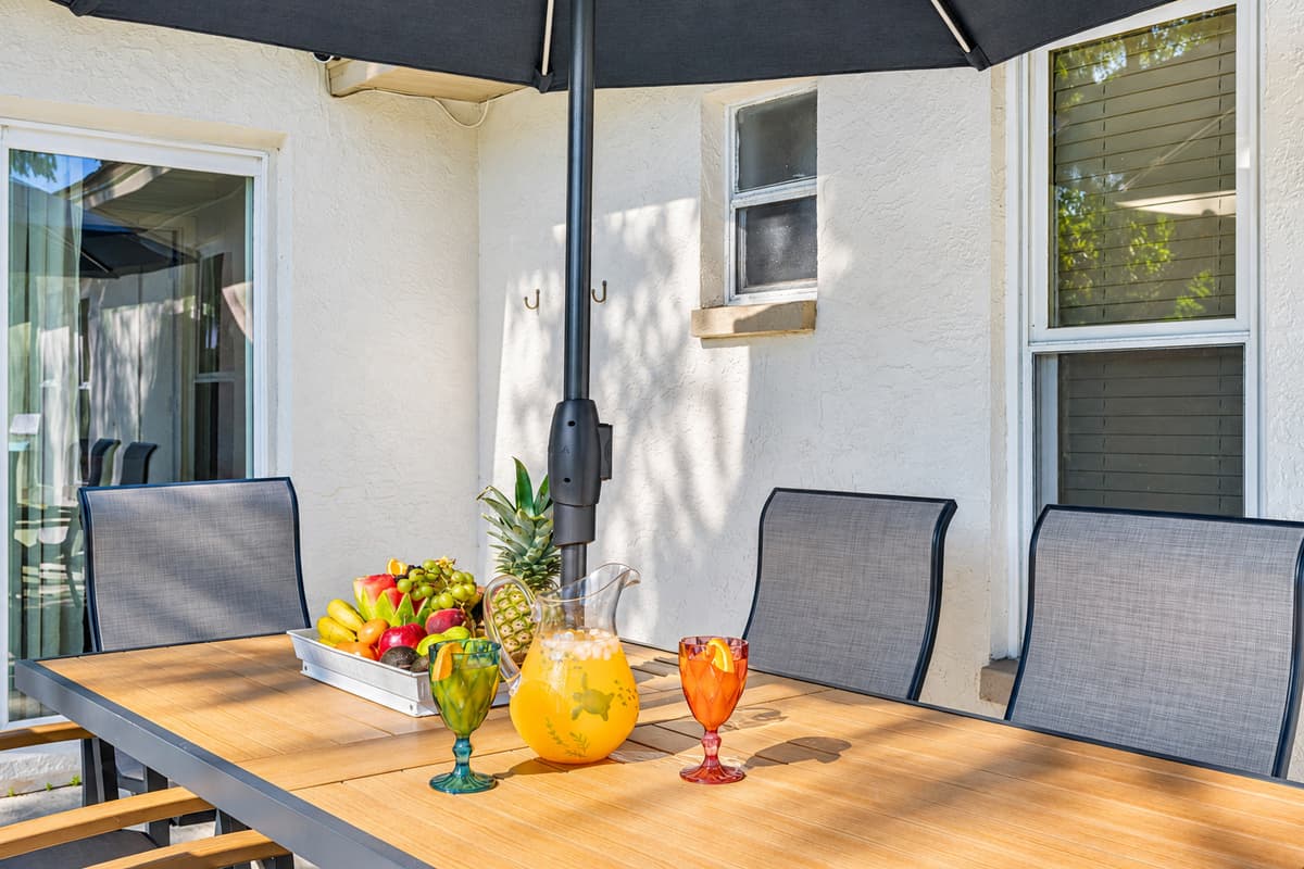 Whether it's a family breakfast as the morning sun dances on the water or an evening barbecue with friends, this inviting area offers ample seating for your group.