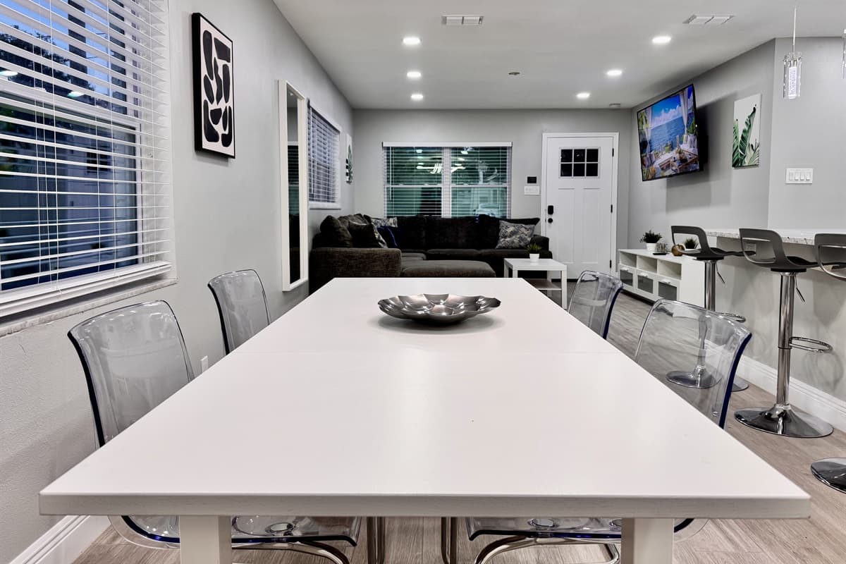 Whether you're enjoying a leisurely family brunch, a romantic dinner, or a fun game night, this space is as versatile as it is inviting.