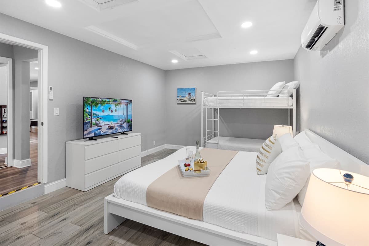 Kids will love climbing into the top bunk while adults can enjoy the comfort of the king bed just a few steps away.