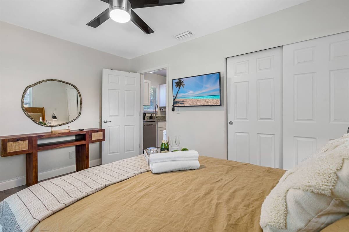 Our wonderful bedroom has a comfortable huge bed, closet, and vanity. This room also has its own TV.  Feel at home in your home away from home. 