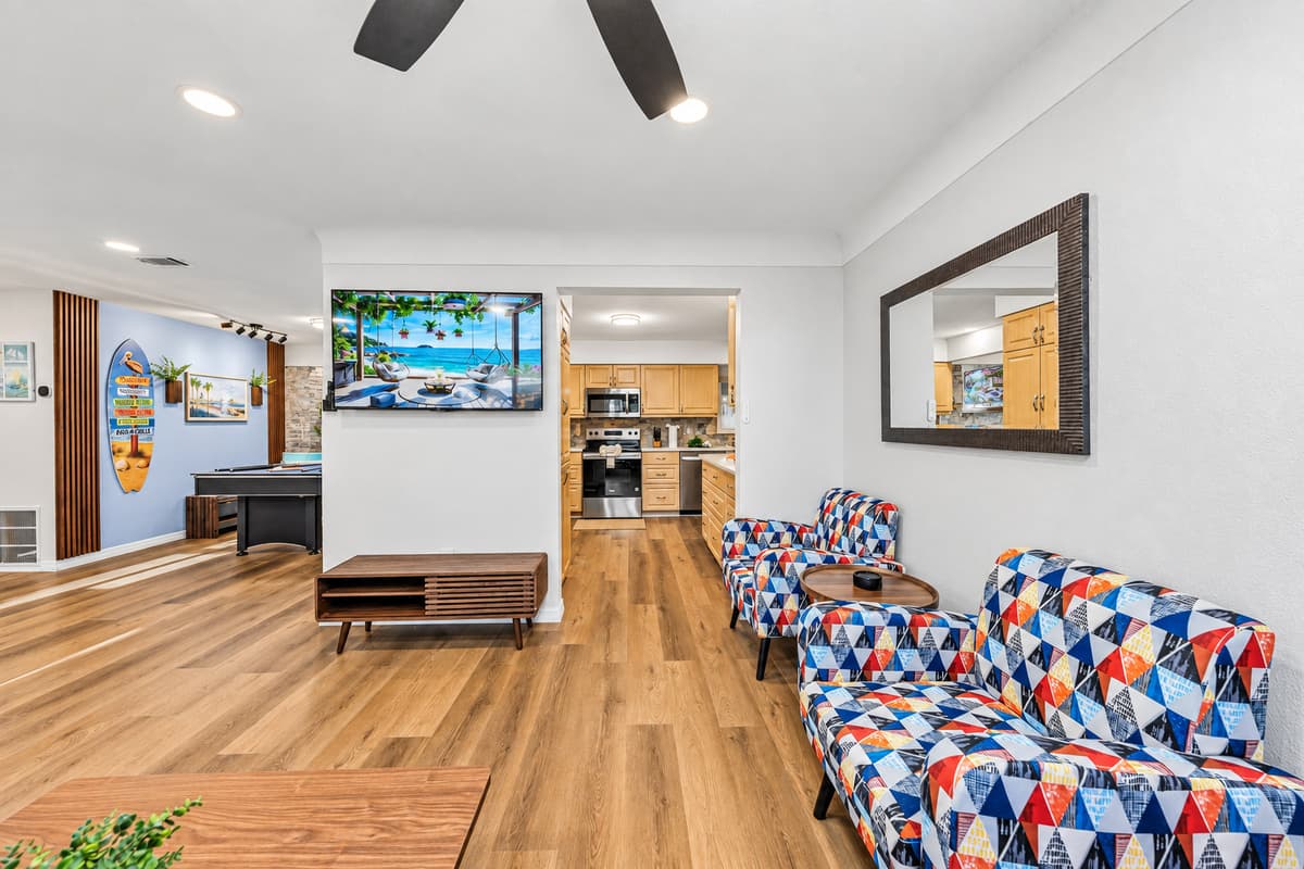 Large open layout connecting living, dining, and kitchen—perfect for groups to gather and enjoy 
