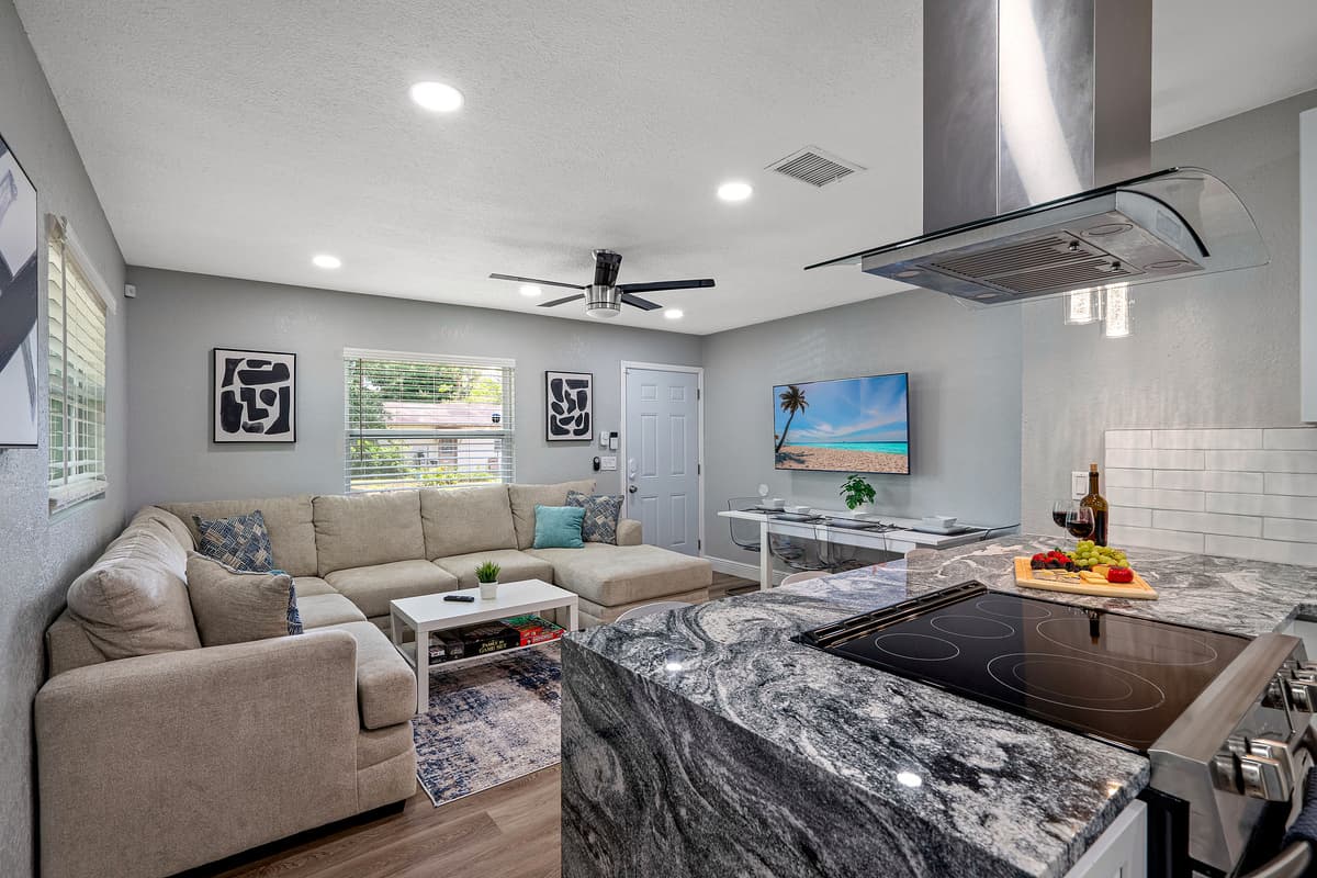 Our spacious living room with comfortable L-Shaped couch where you and your family and friends can bond and relax.