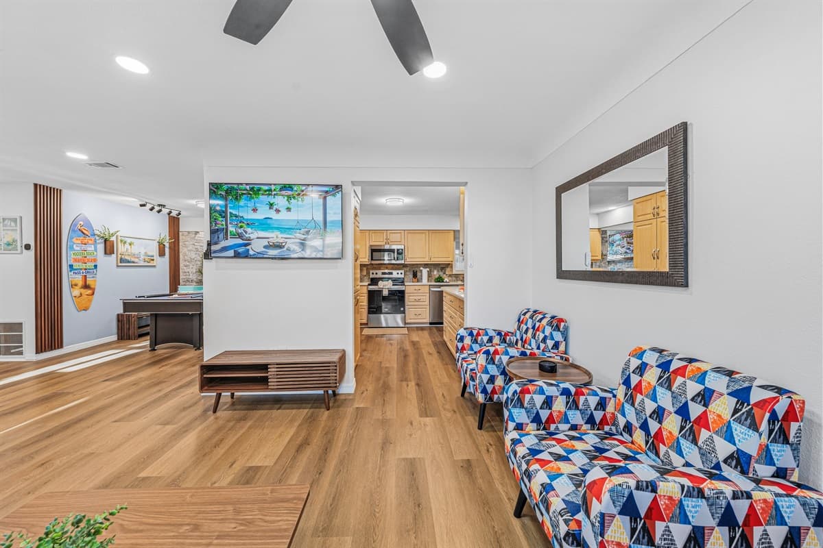 Large open layout connecting living, dining, and kitchen—perfect for groups to gather and enjoy 