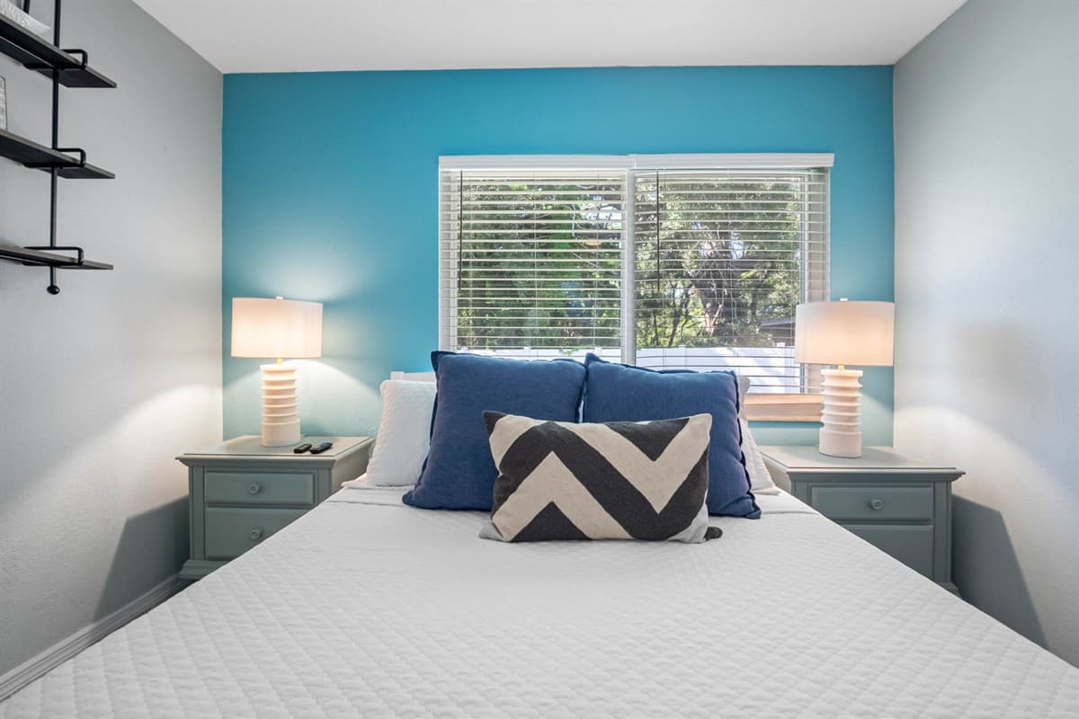 A cozy and stylish queen retreat offering comfort, calm, and the perfect place to recharge.