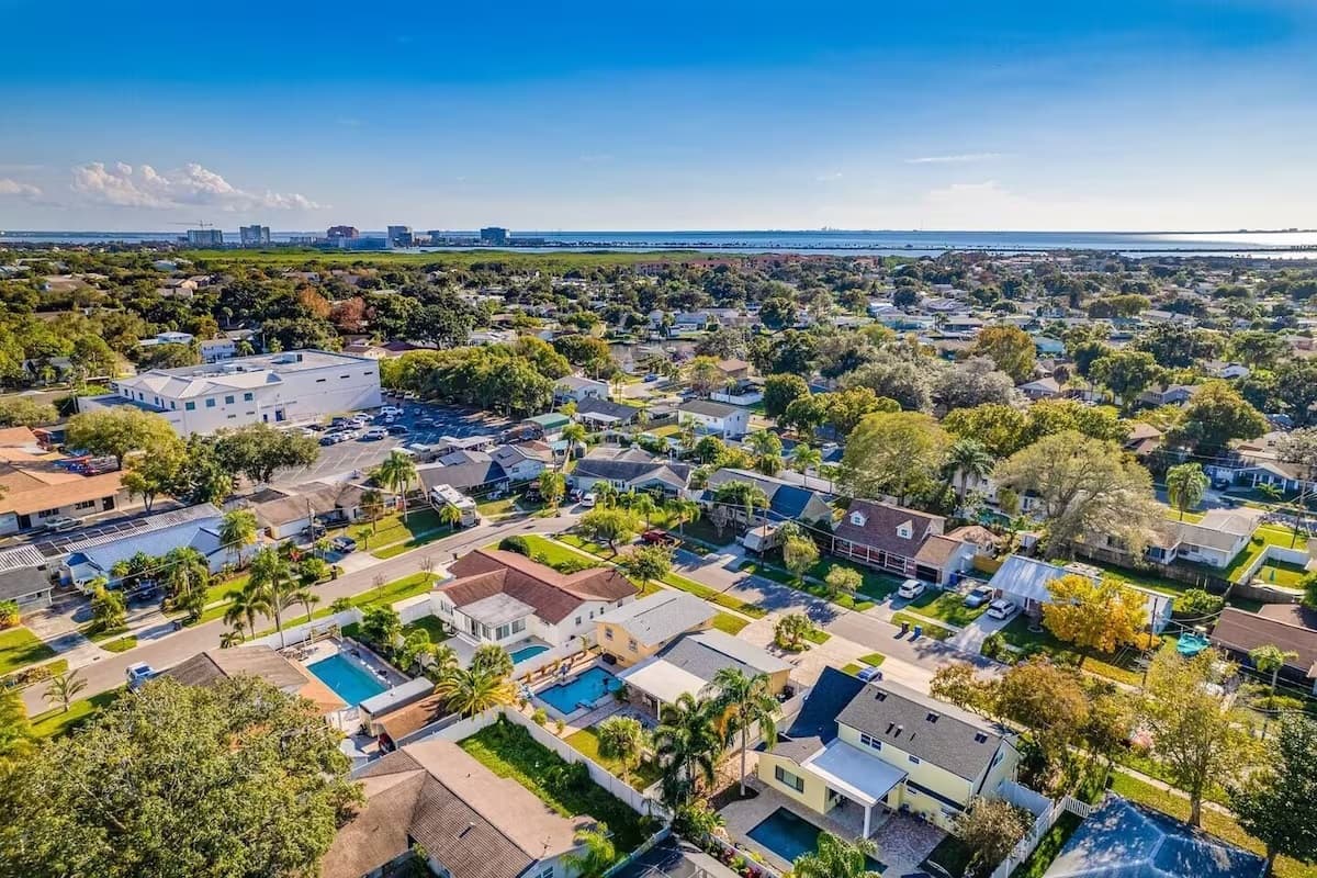 Aerial view of our beautiful property and the stunning surroundings. Enjoy the view outside showcasing beautiful properties in the area.