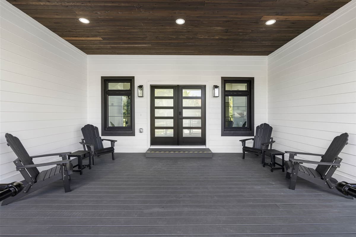 On the front porch are comfortable chairs that beckon you to sit back and relax. 