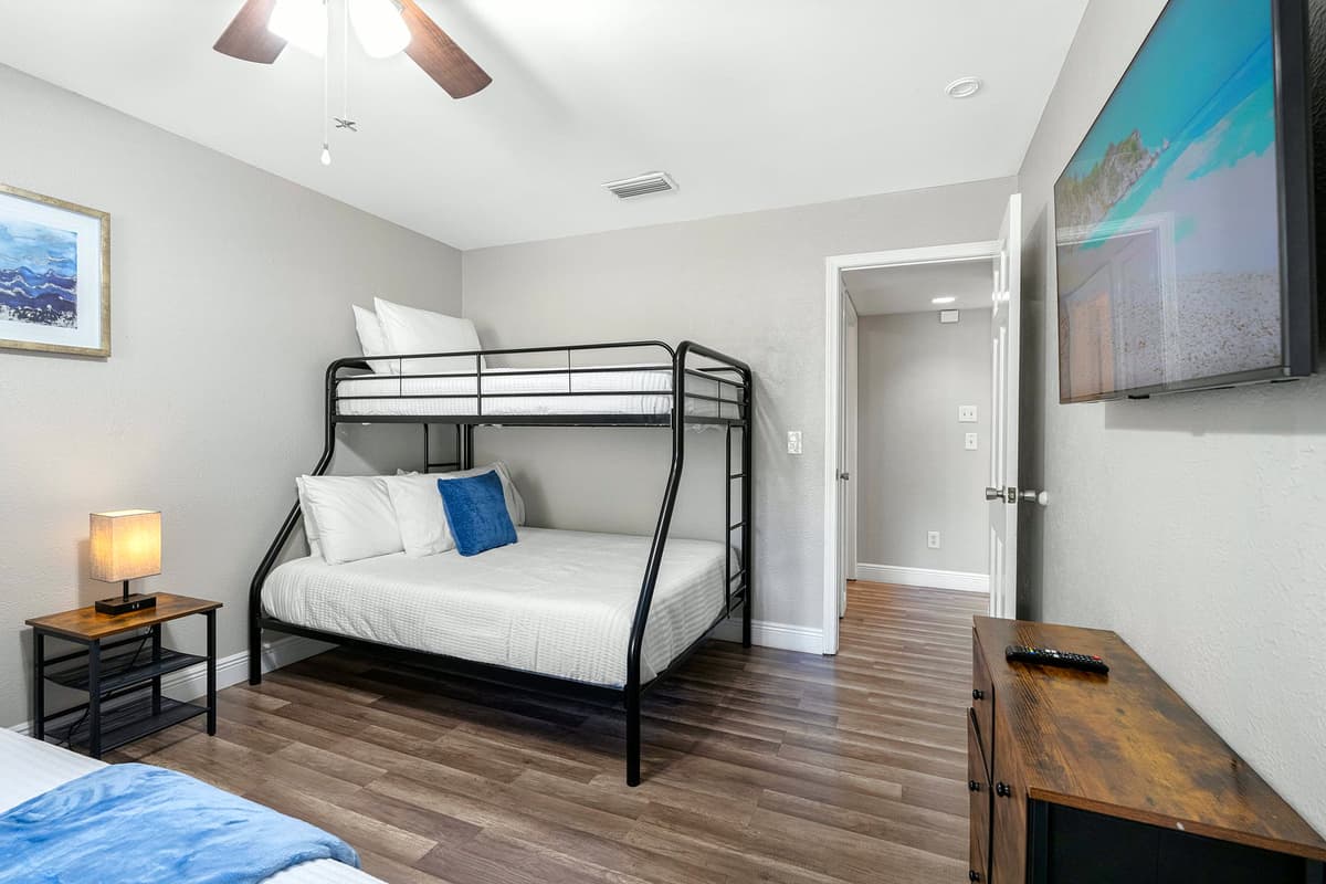 This versatile bedroom offers multiple sleeping options, making it perfect for larger parties.