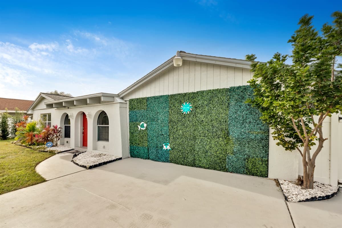 Feel the allure of classic design and enjoy the convenience of a spacious driveway.