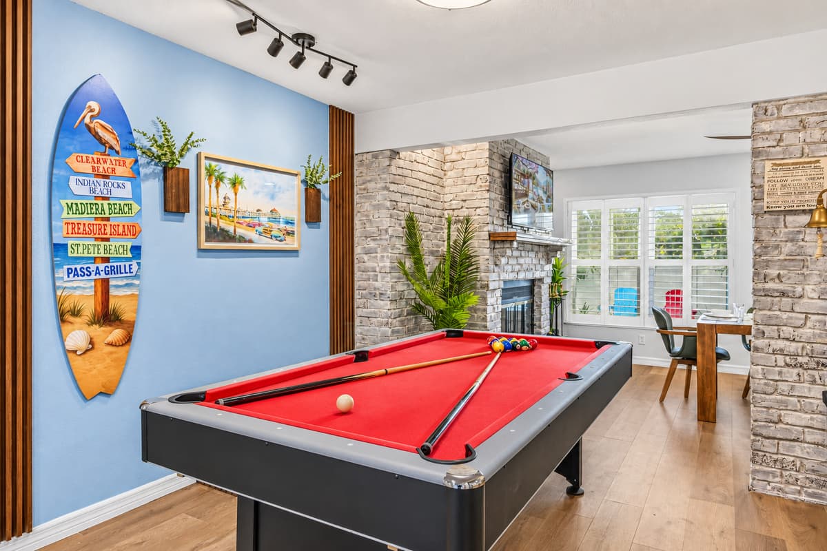 Game room with pool table and unique design touches—ideal for relaxing and unwinding 