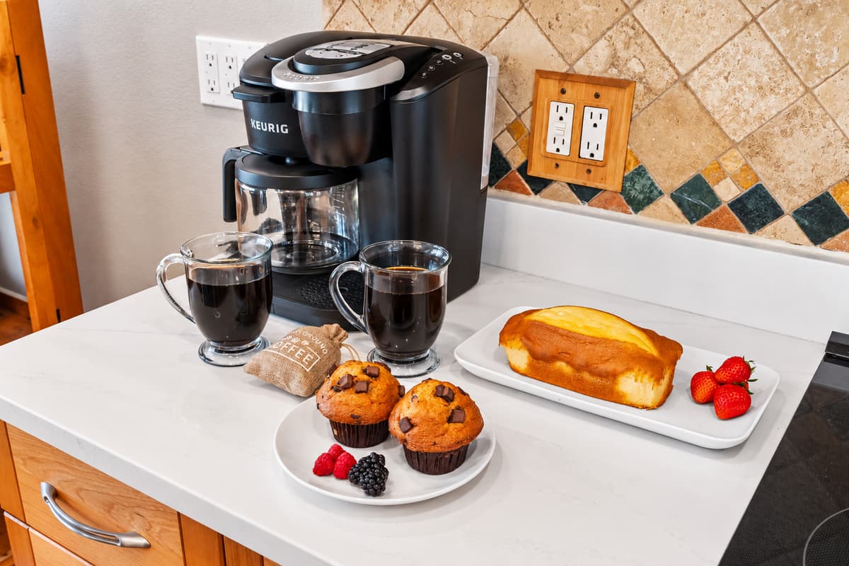 From the coffee station to the neatly organized appliance shelf, this kitchen is designed with everyday convenience in mind.