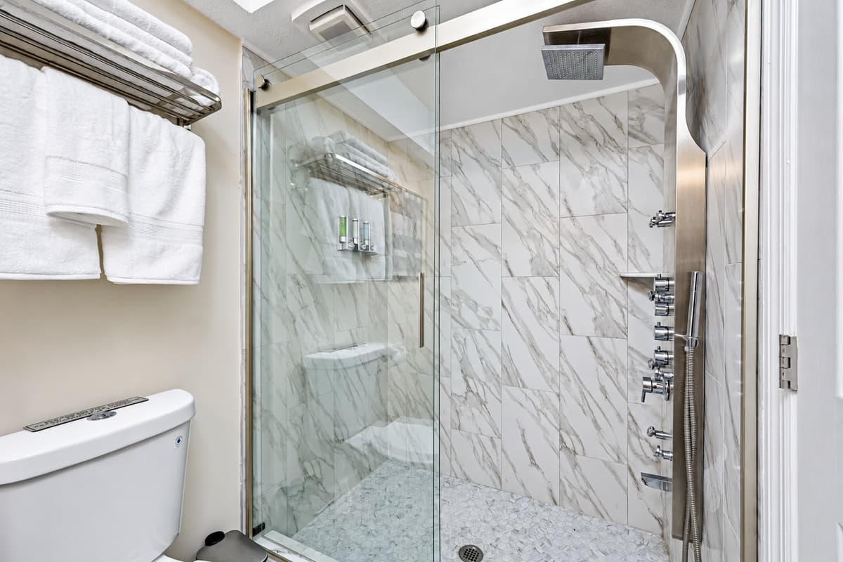 Great bathroom with toilet, sink, and walk-in shower. Feel fresh and clean after a long day of travel from your home to your home away from home. If you are interested in this property, send us an inquiry now!