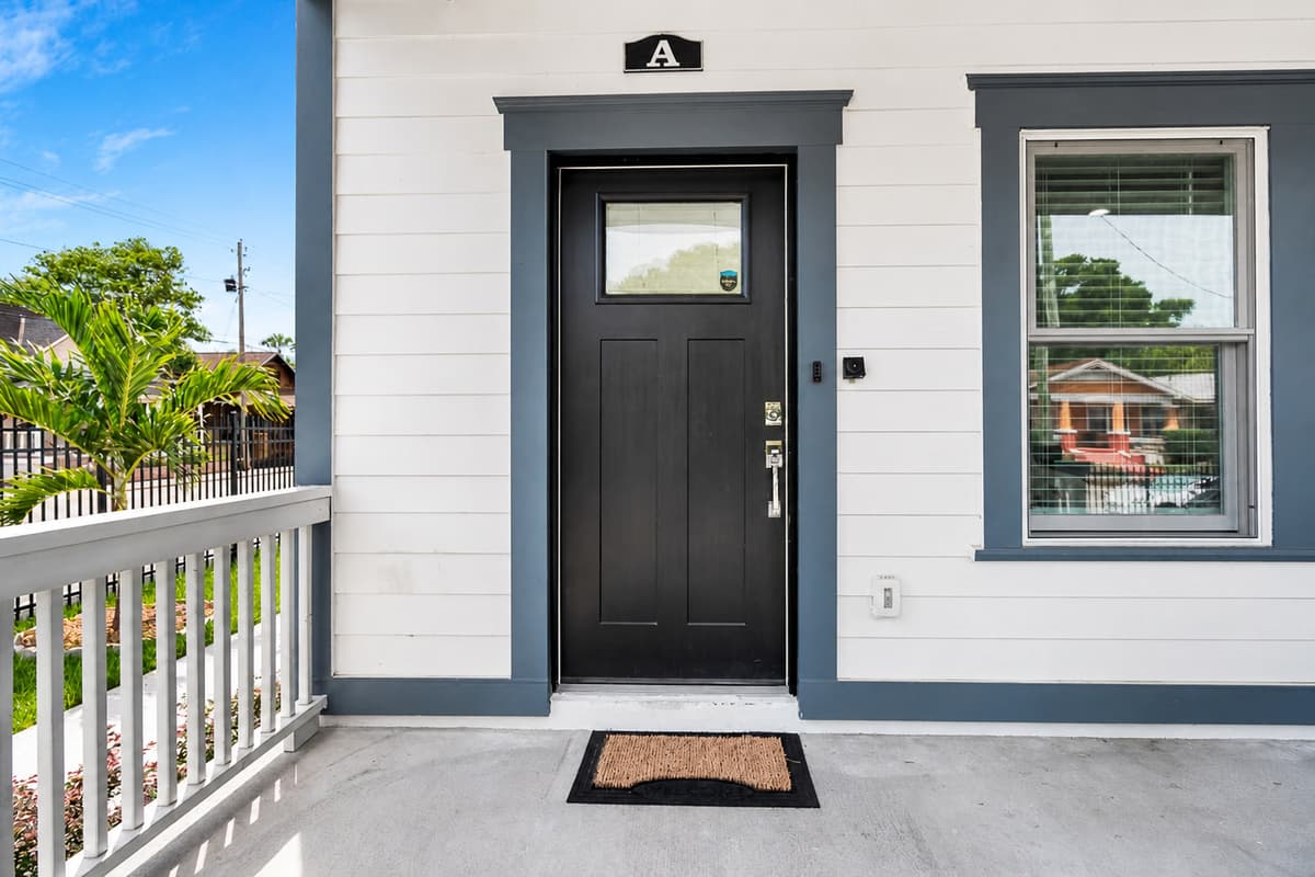 The stunning door leading to the beautiful inside of this lovely property! Bring family and friends on this staycation! Send us a message and book now!