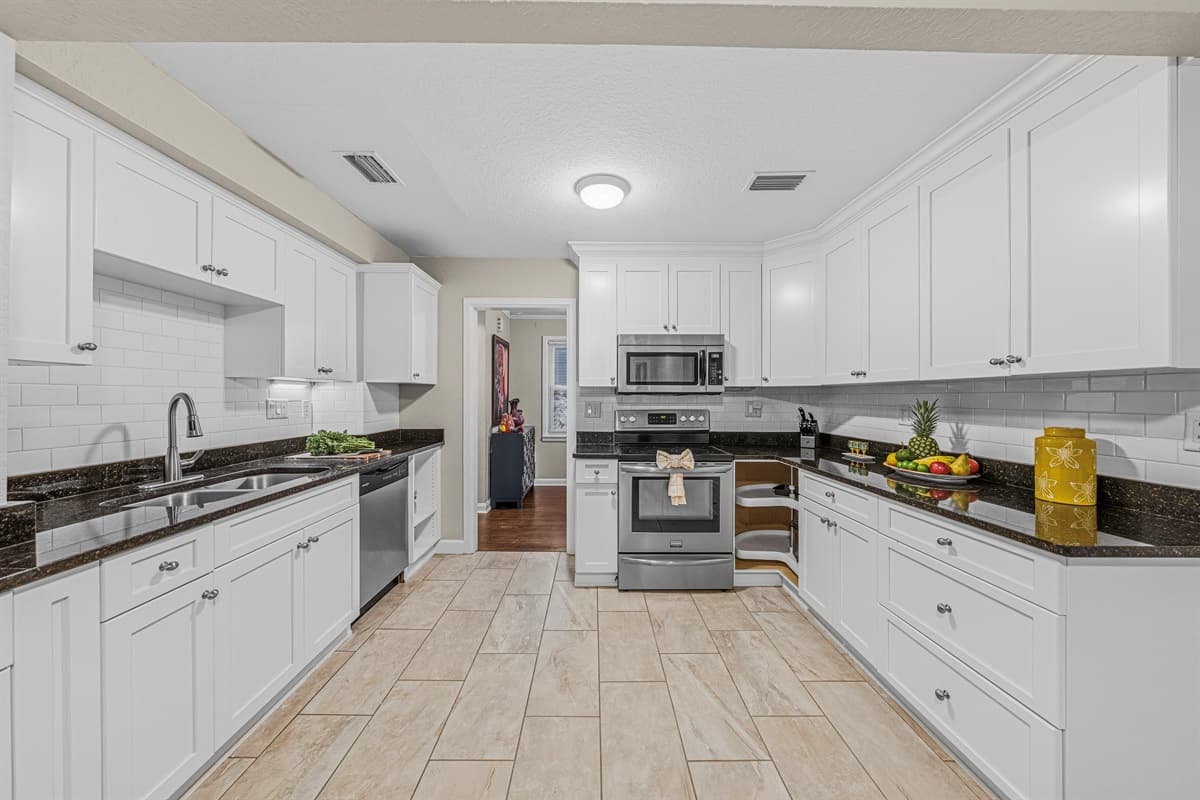 Expansive kitchen layout with plenty of prep space, perfect for group cooking and entertaining.