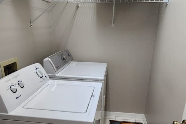 Embrace the simplicity and efficiency of our exceptional laundry room, where cleanliness meets convenience.