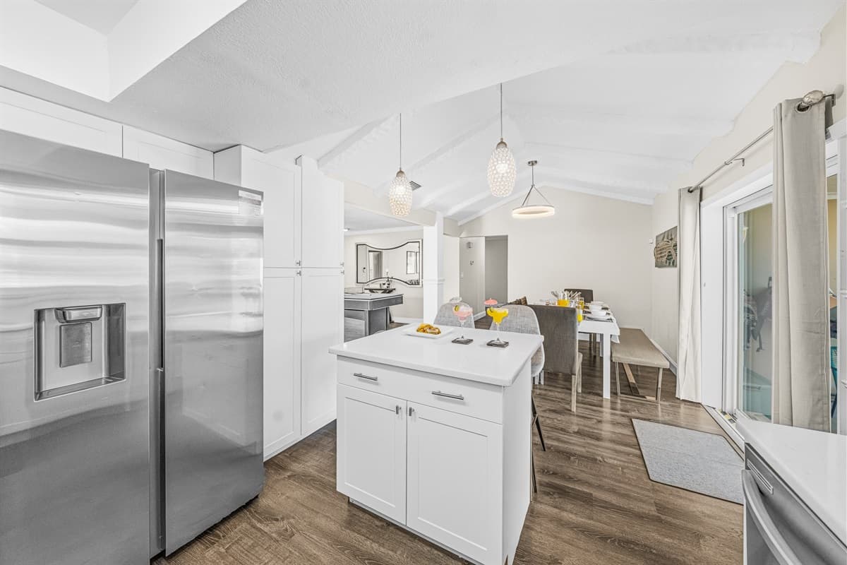 Bright and airy kitchen with a large island, perfect for family meals and entertaining.