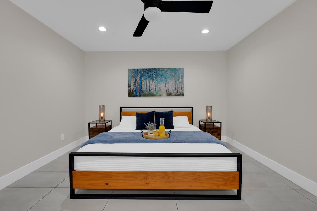 Wake up refreshed in a serene, beautifully designed bedroom. Every detail is set for a comfortable, restful stay.