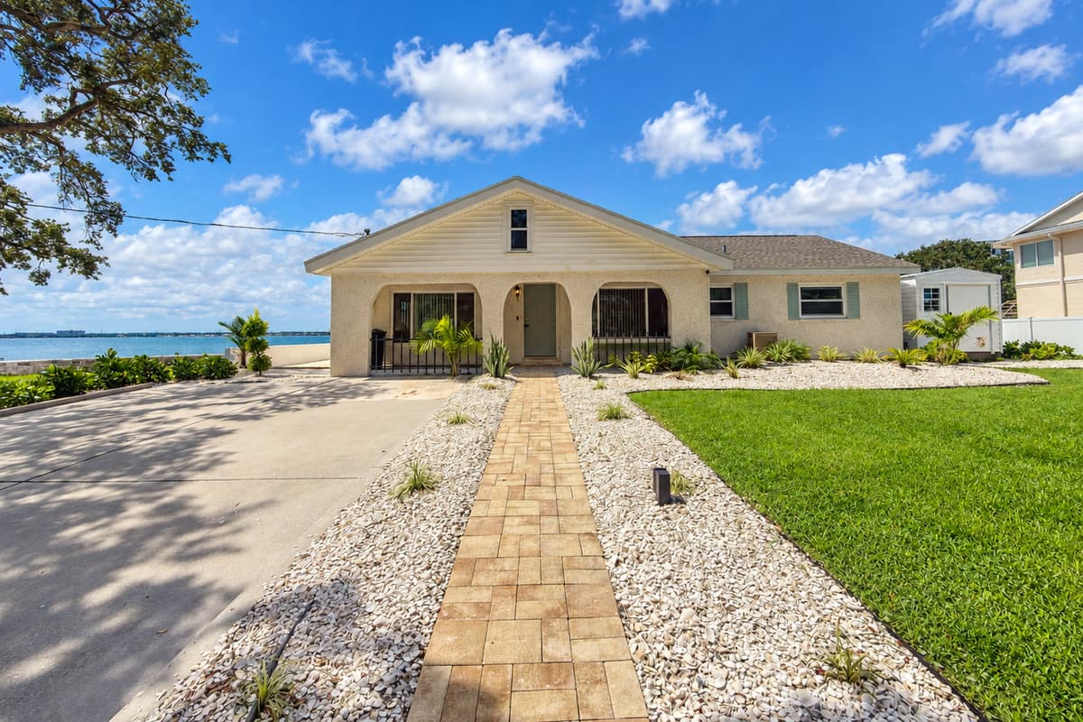 Bayview front exterior and driveway parking.