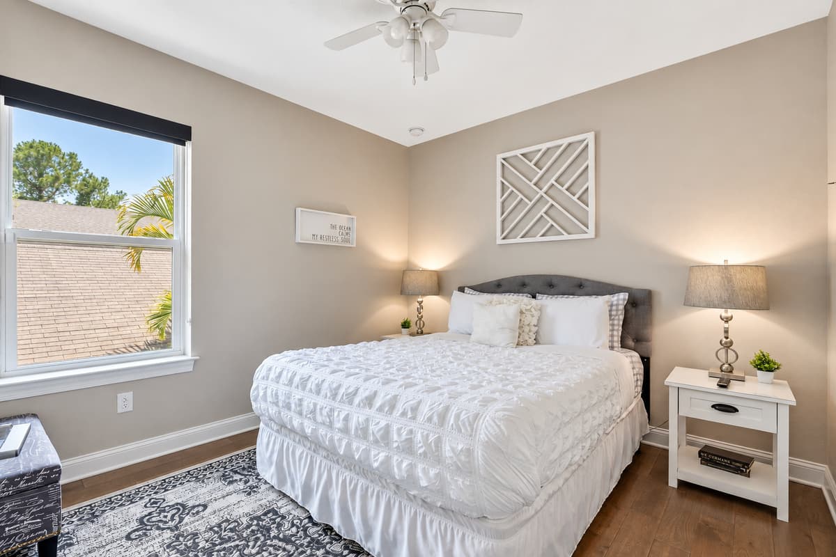 The room's elegant decor and soothing color palette create a serene ambiance, perfect for unwinding after a day of exploring or business.