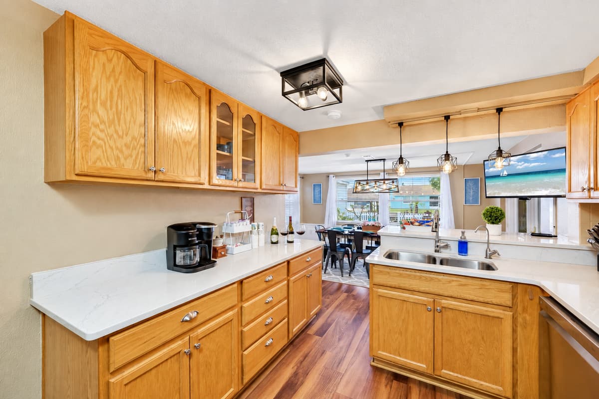 Our spacious kitchen has a lot of storage too! It's equipped with a dishwasher and has a lot of cabinets and drawers for kitchen tools and utensils.