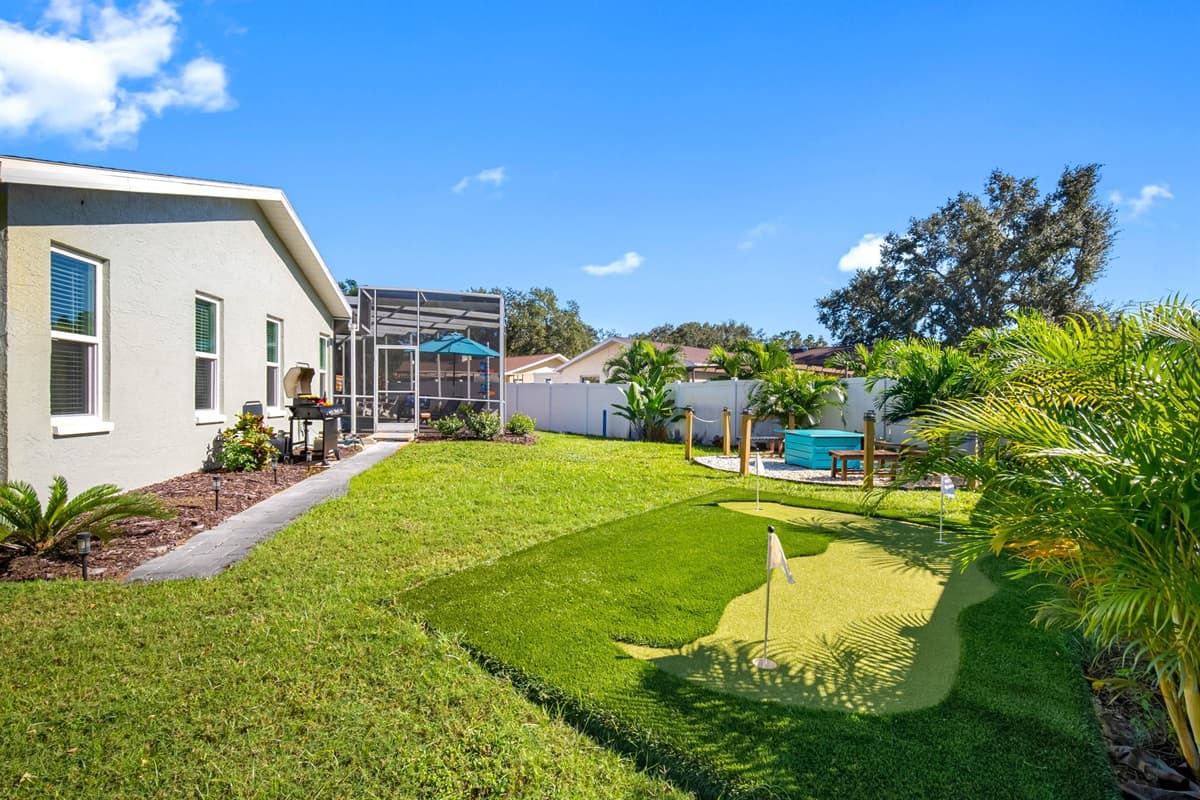 Whether you’re grilling lunch, playing yard games, or lounging by the firepit, this backyard captures the true essence of Florida living.