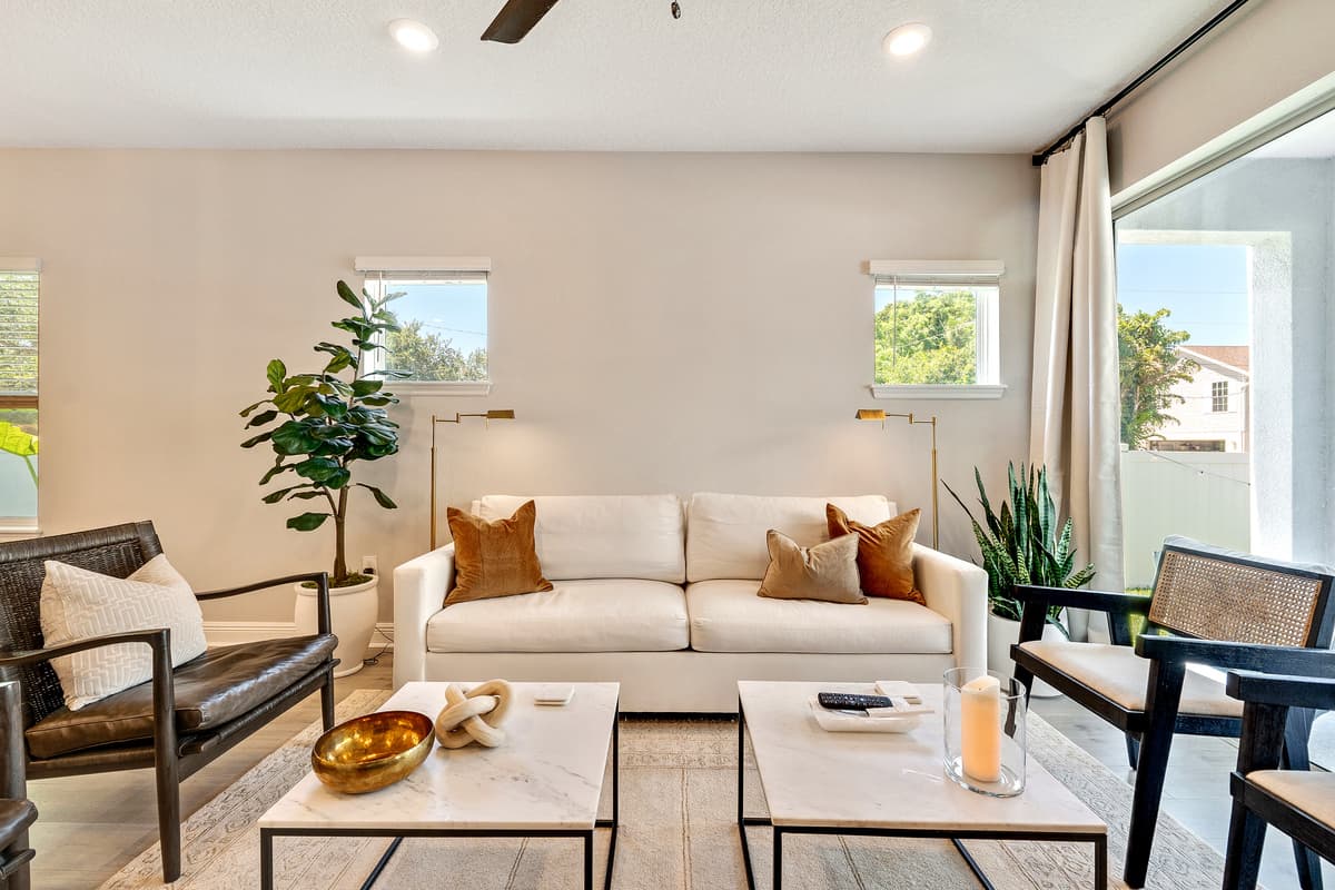 Ample seating beckons, offering a variety of options for lounging and socializing.