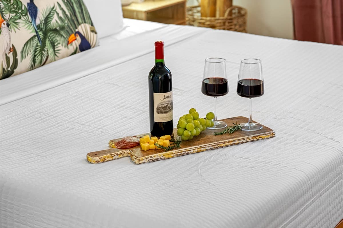 Positioned to make the most of the room’s serene atmosphere, the bed invites you to escape into a world of pure comfort.