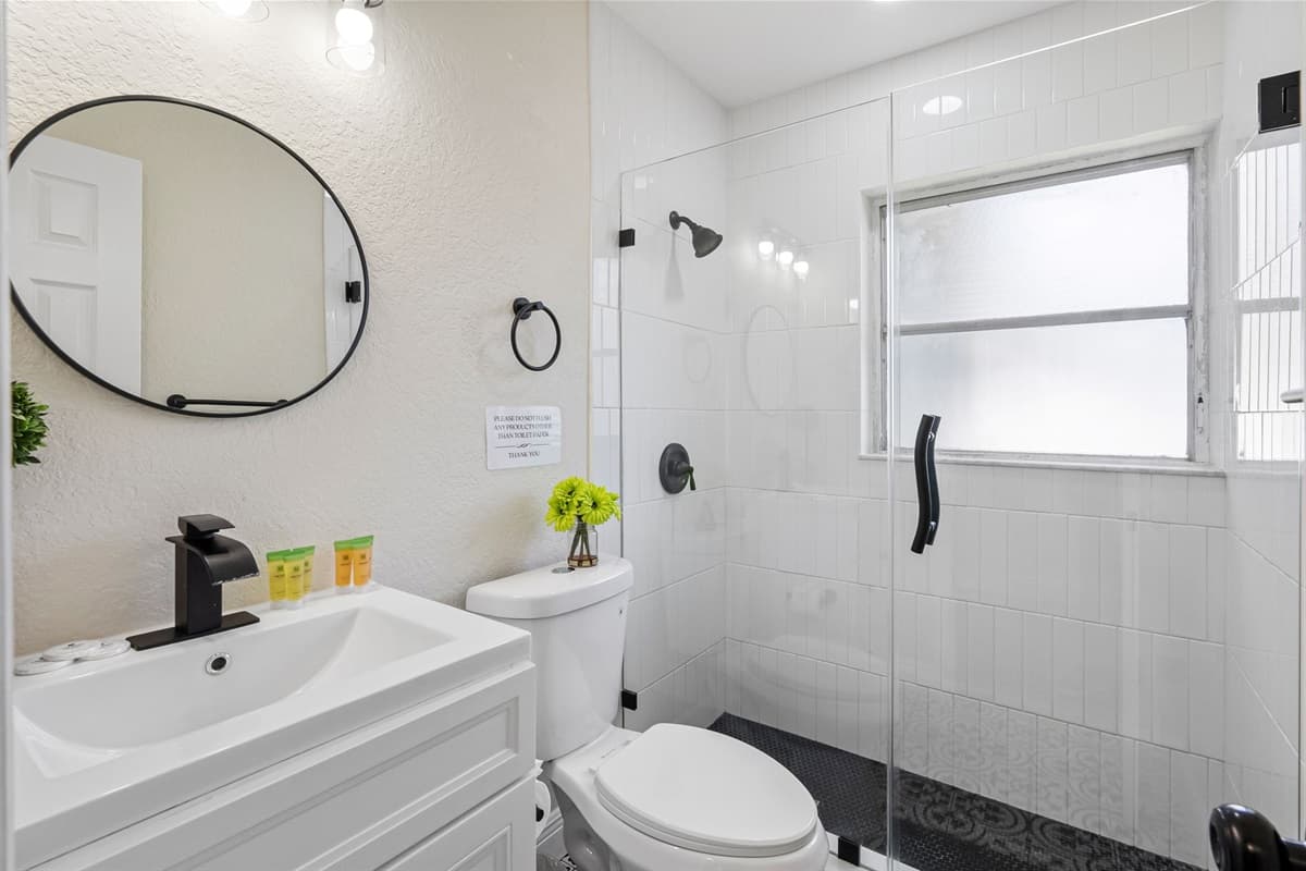 Generous vanity space and well-lit mirrors make it easy to get ready in the morning, while under-sink storage or open shelving helps keep your toiletries neatly organized throughout your stay.