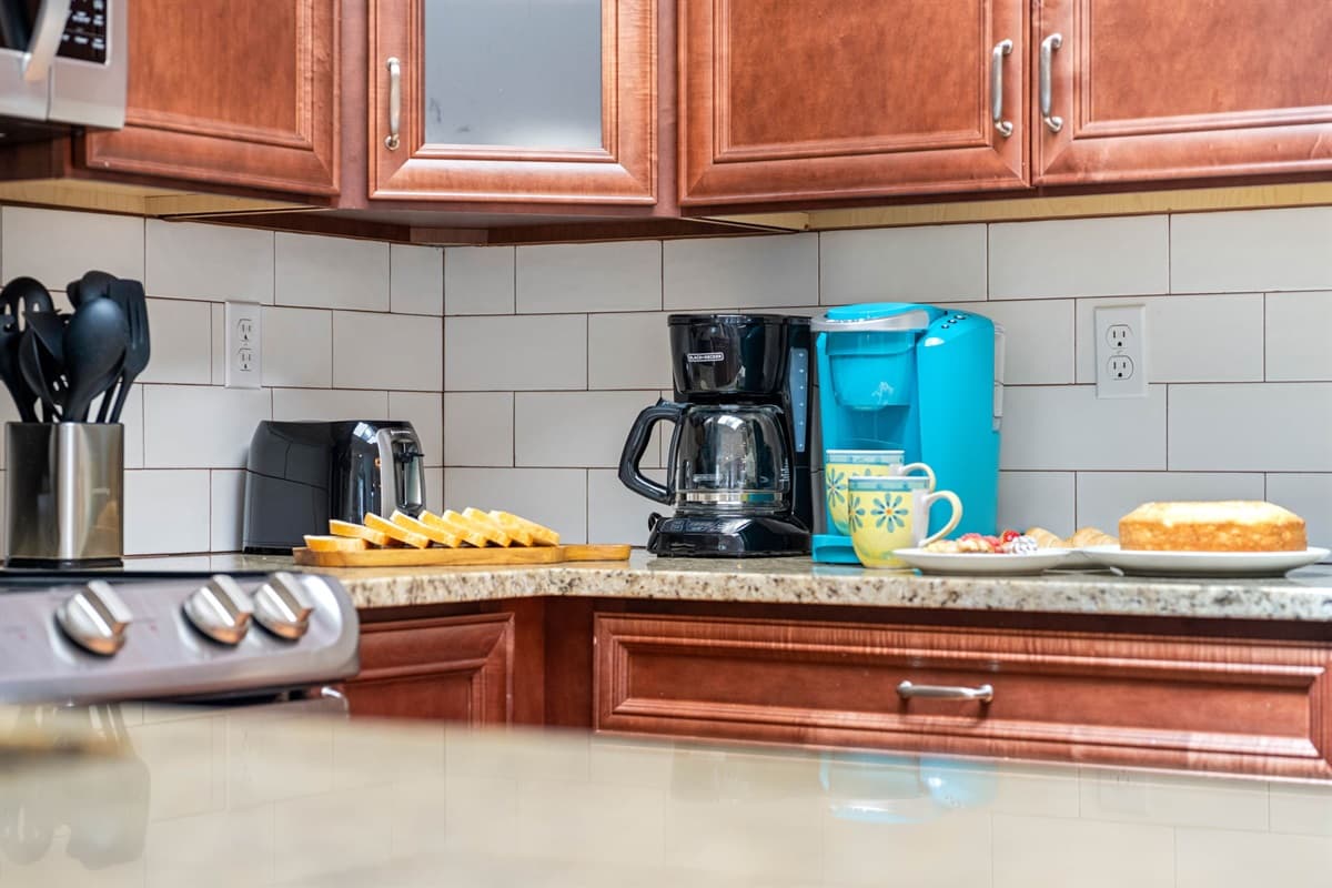 The kitchen is thoughtfully designed to offer everything you need to prepare and enjoy delicious home-cooked meals during your stay.