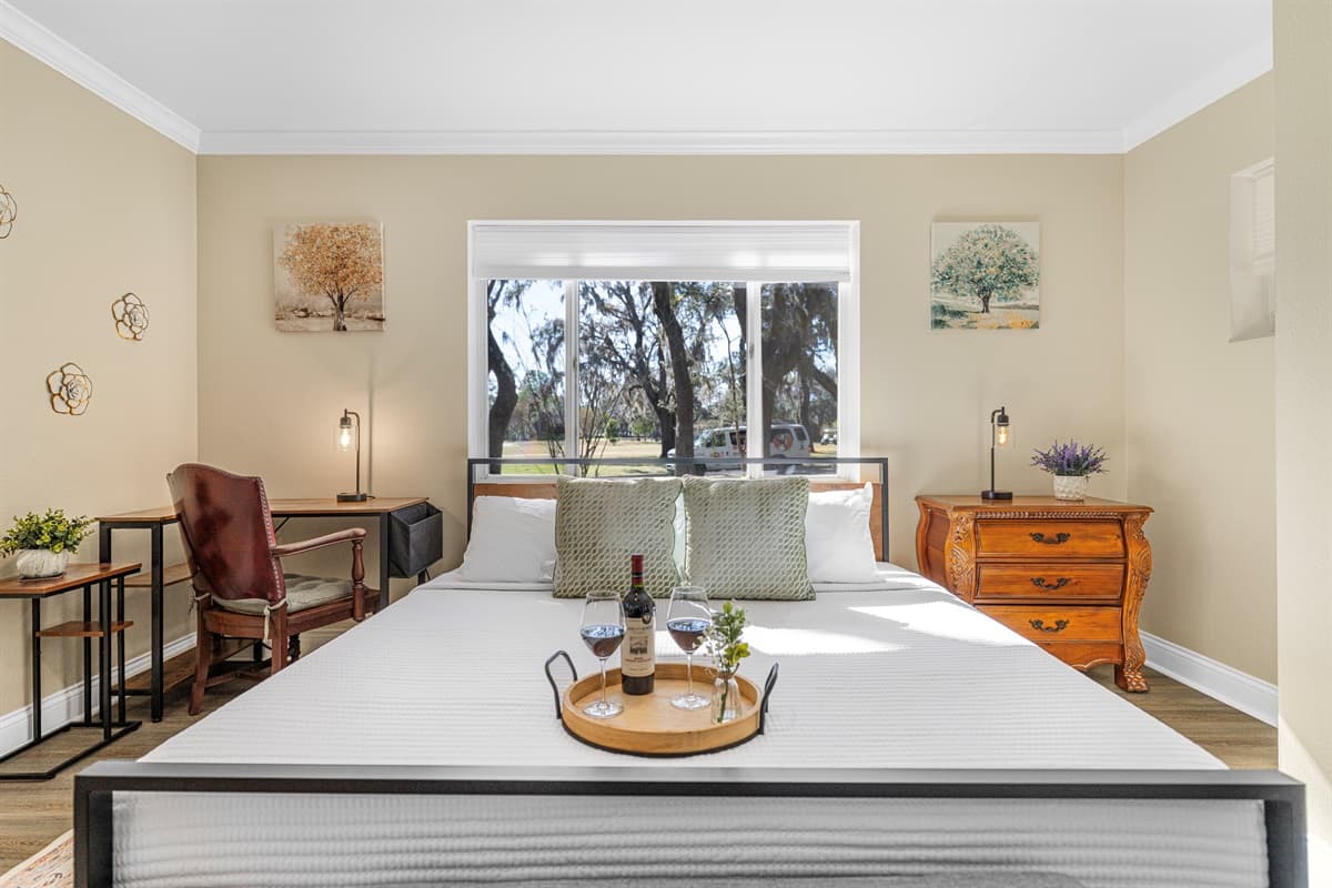 Enjoy hotel-style comfort in this beautifully appointed king bedroom with elegant décor and plenty of space to unwind.